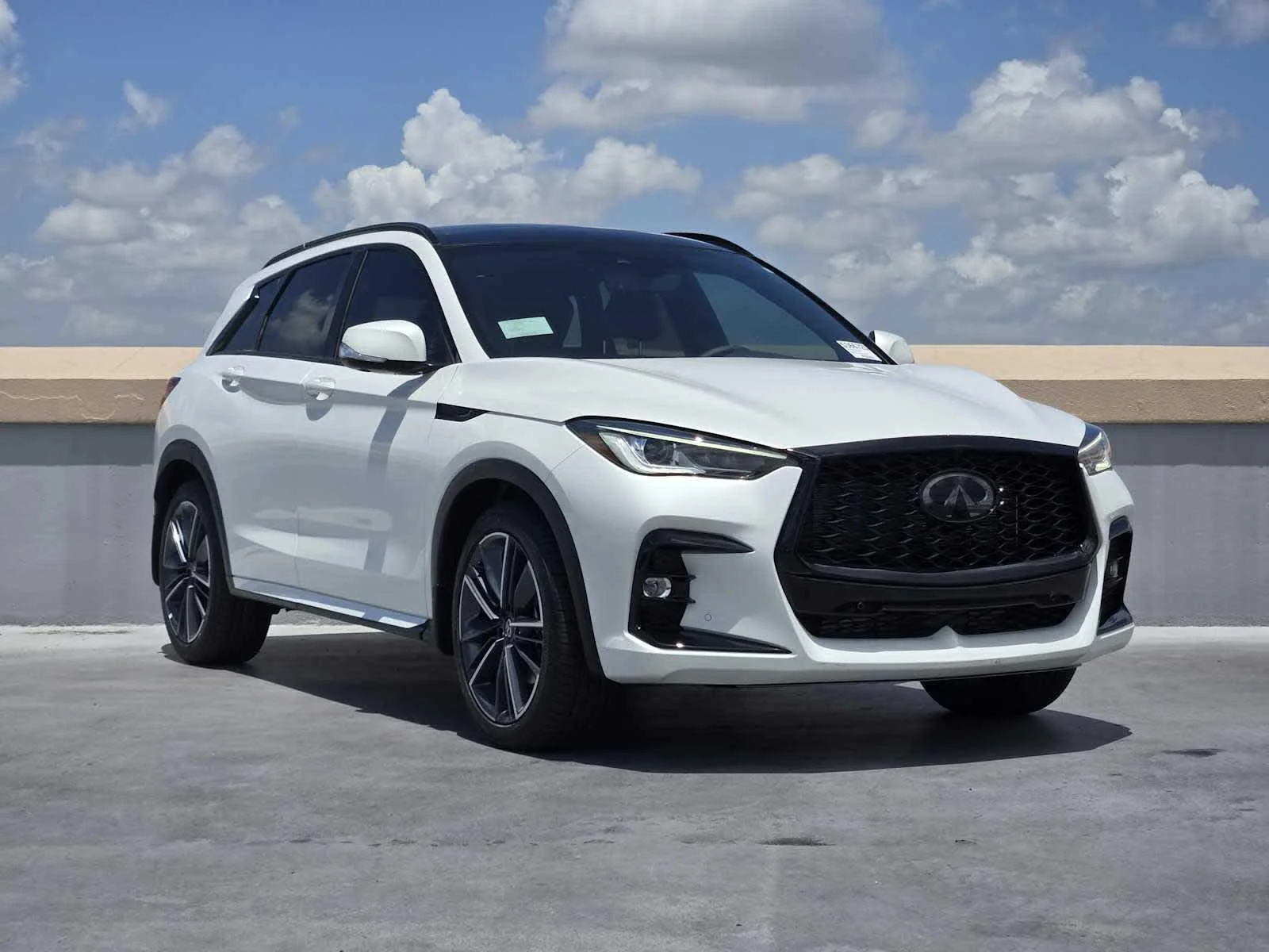 Certified Used 2025 Radiant White INFINITI SPORT image 2