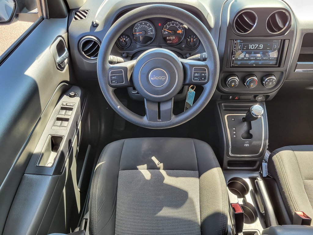 Used 2015 Billet Silver Metallic Clearcoat Jeep Sport image 10