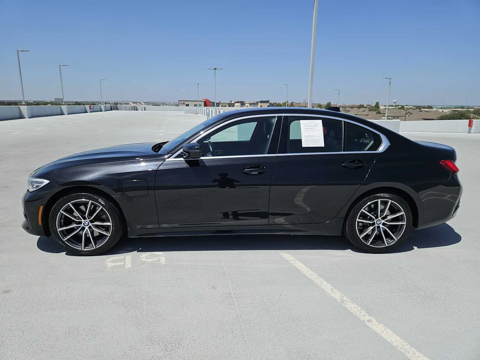 Used 2021 Black Sapphire Metallic BMW 330e image 4