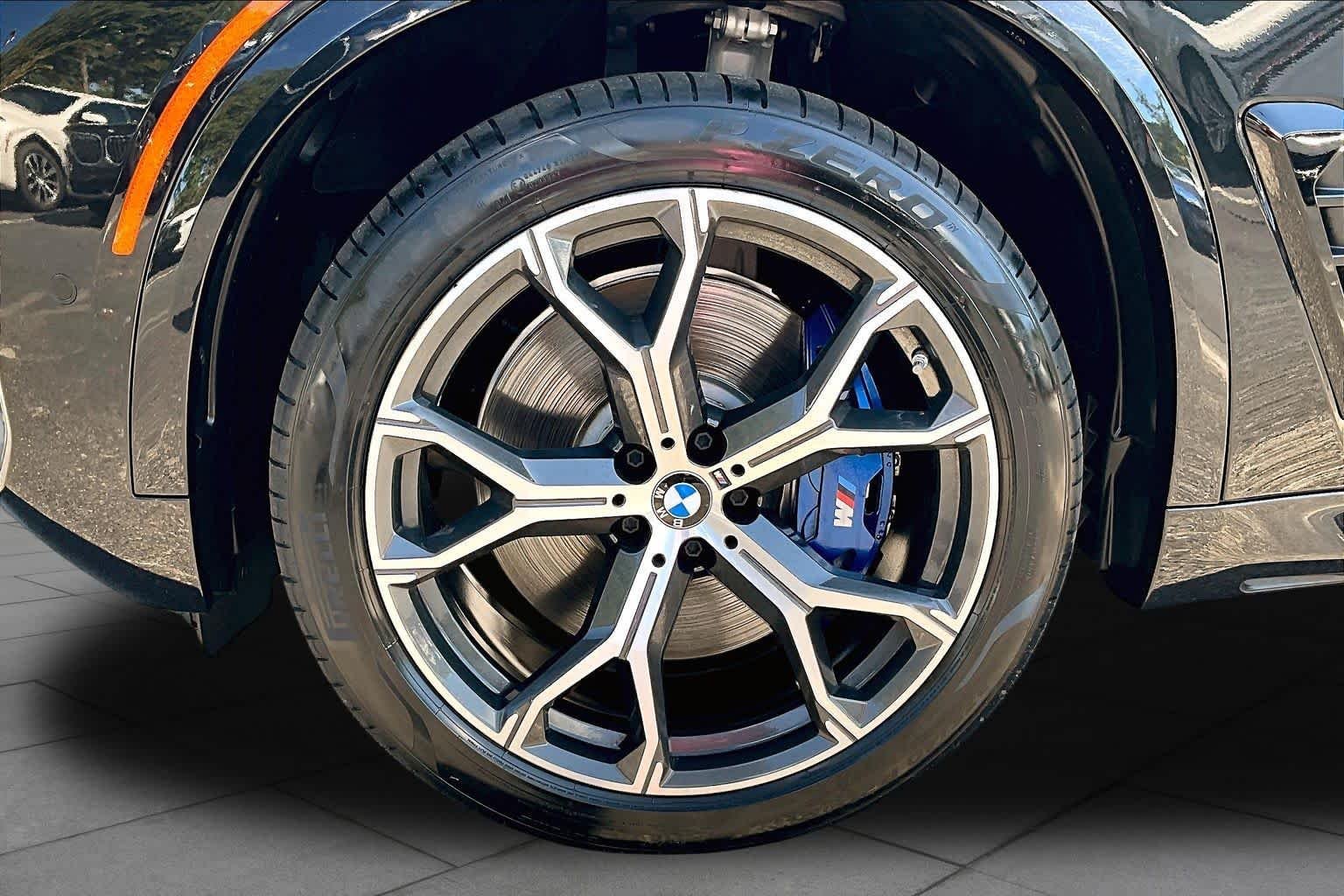 Used 2026 Black Sapphire Metallic BMW M60i image 11