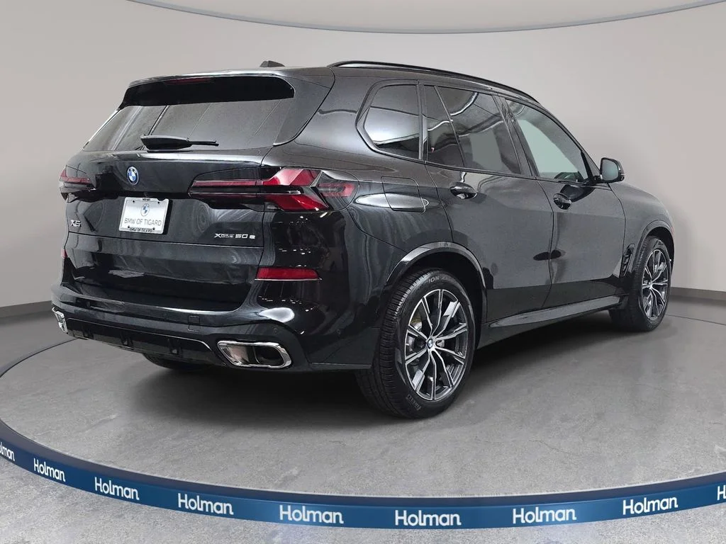 Used 2026 Black Sapphire Metallic BMW xDrive50e image 6