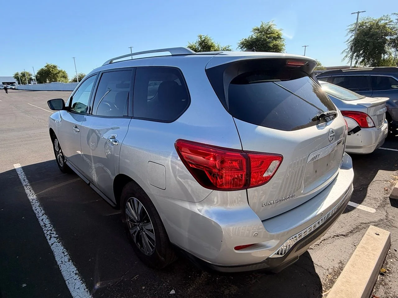 Used 2018 Brilliant Silver Metallic Nissan SV image 5