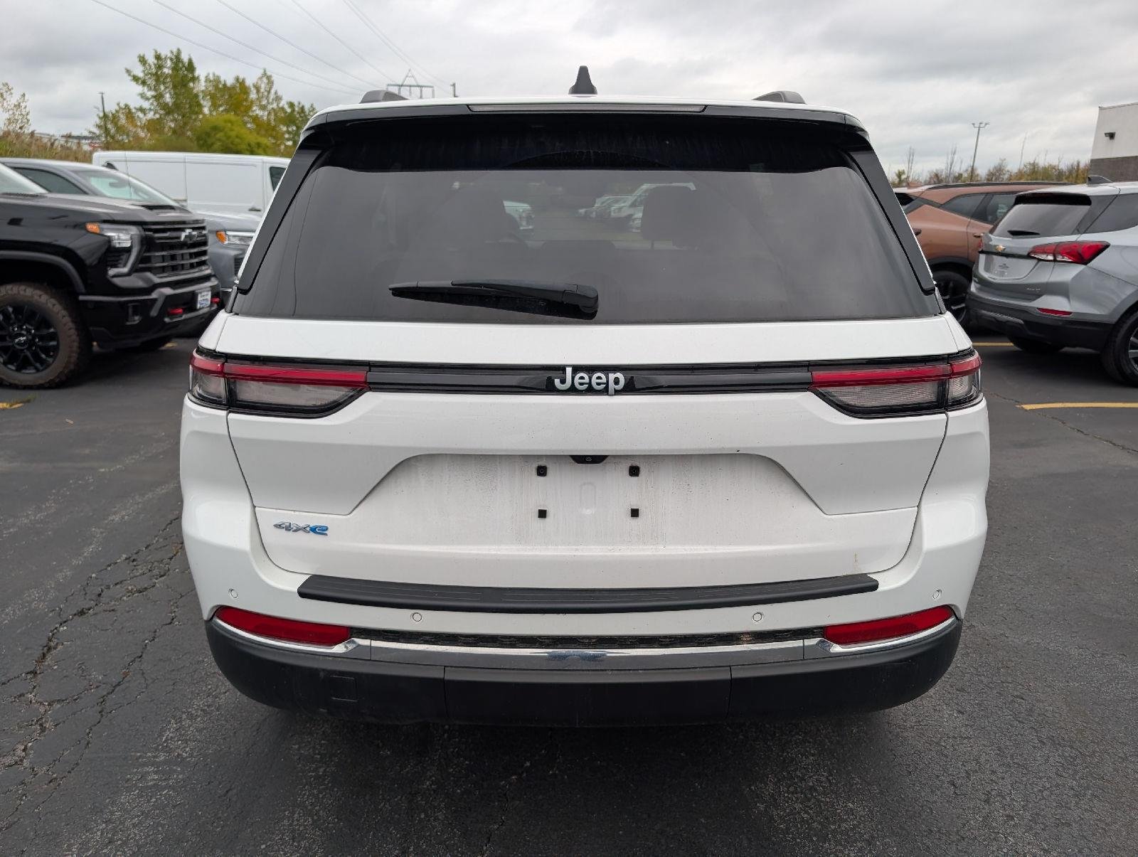 Used 2024 Bright White Clearcoat Jeep 4xe image 6