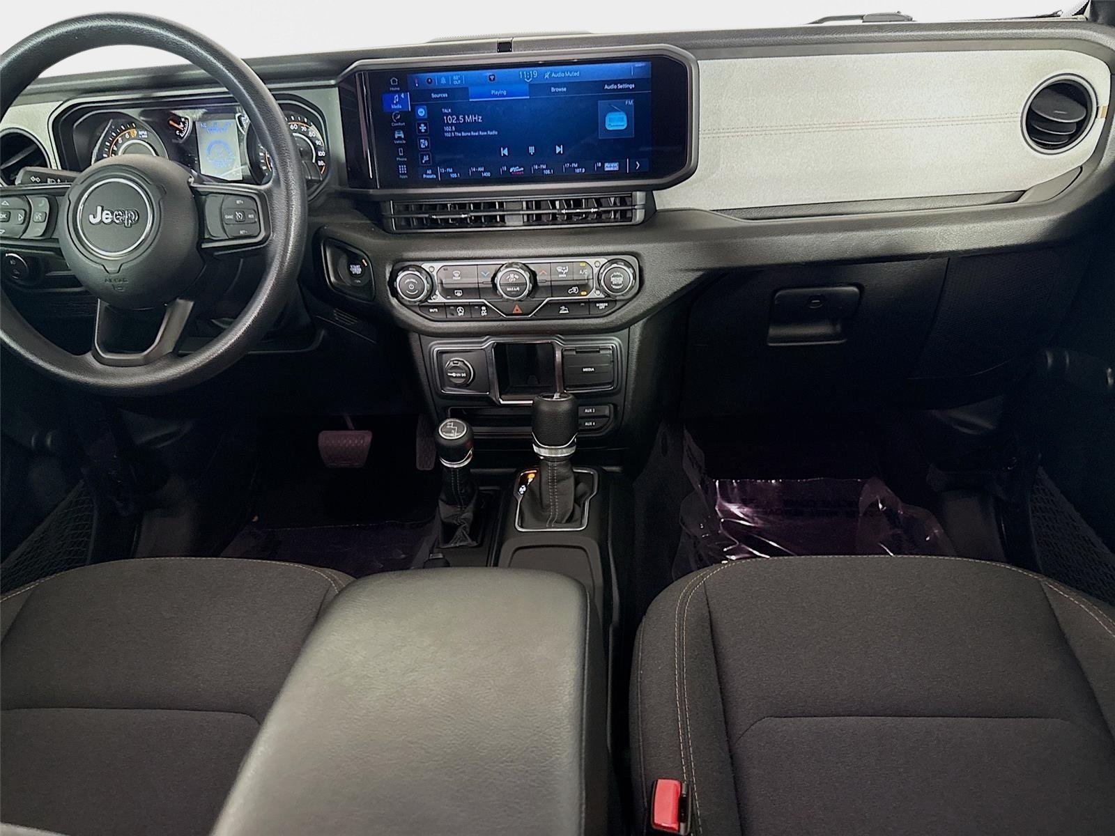 Used 2024 Granite Crystal Metallic Clearcoat Jeep Sport image 23