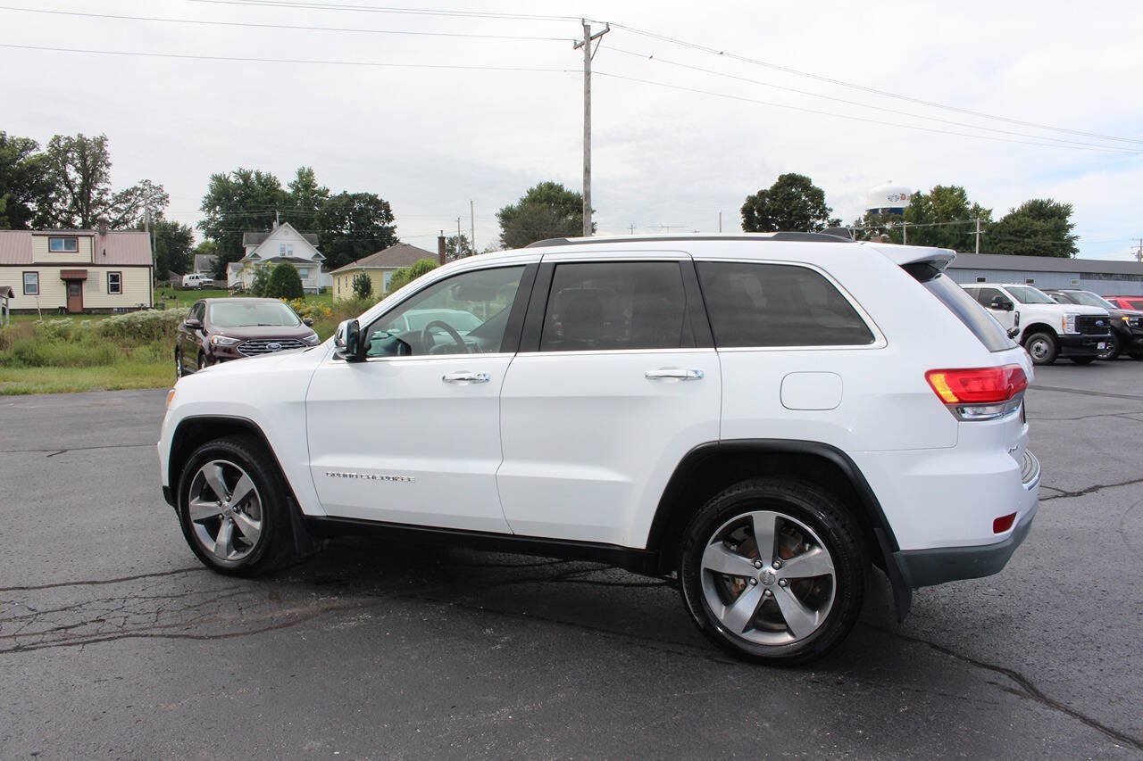 Used 2015 Bright White Clear Coat Jeep Limited 4x4 4dr SUV image 2