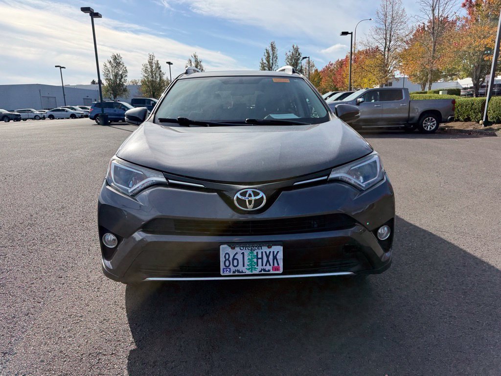 Used 2016 Magnetic Gray Metallic Toyota XLE image 2
