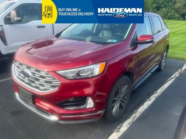 Used 2019 Ruby Red Metallic Tinted Clearcoat Ford Titanium image 1