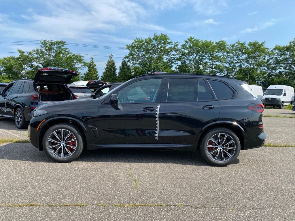 New 2026 Black Sapphire Metallic BMW xDrive50e image 4