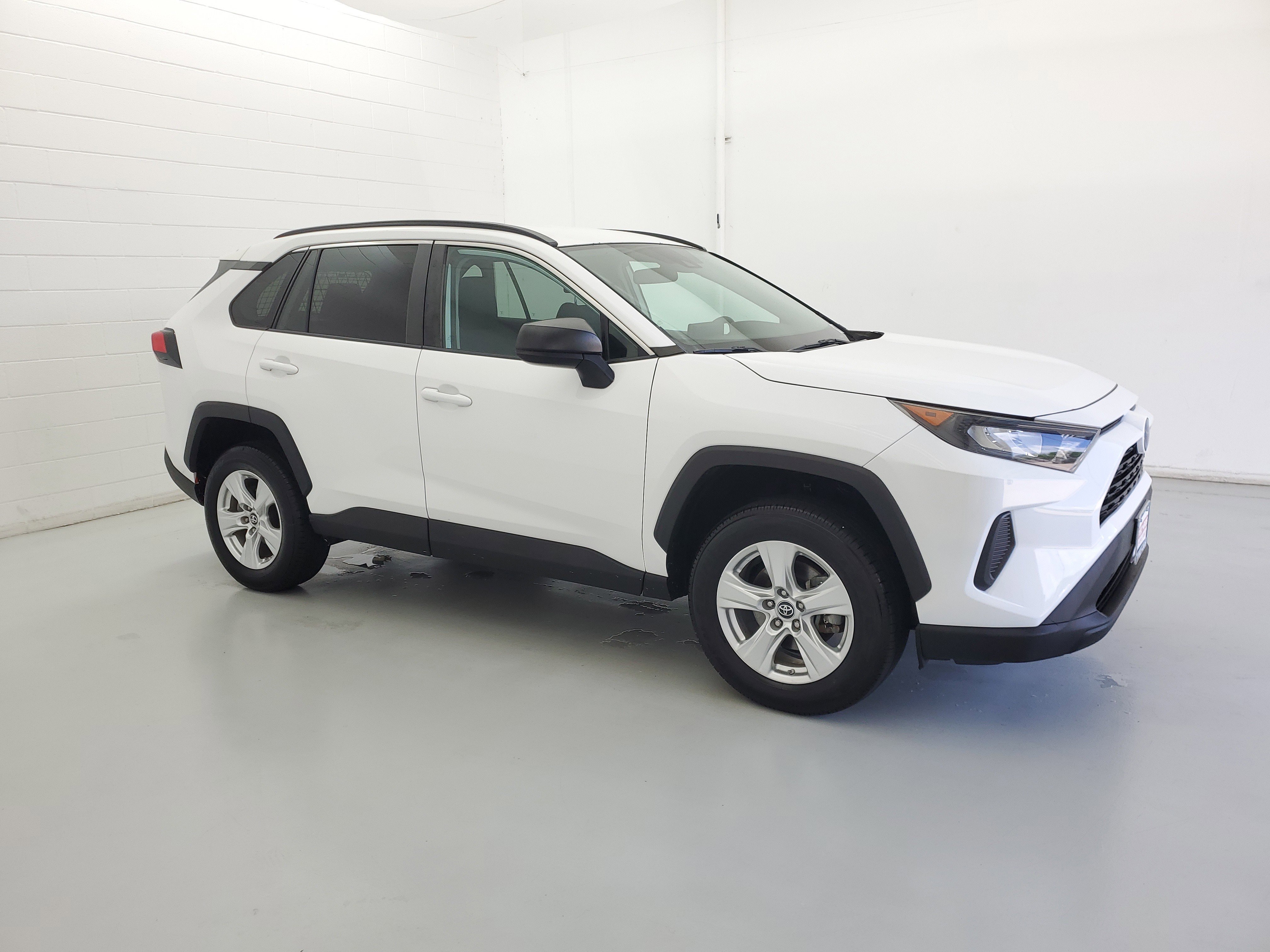 Used 2021 Super White Toyota LE image 4