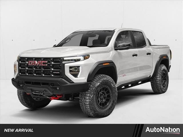 Used 2024 Summit White GMC 4WD AT4 image 1