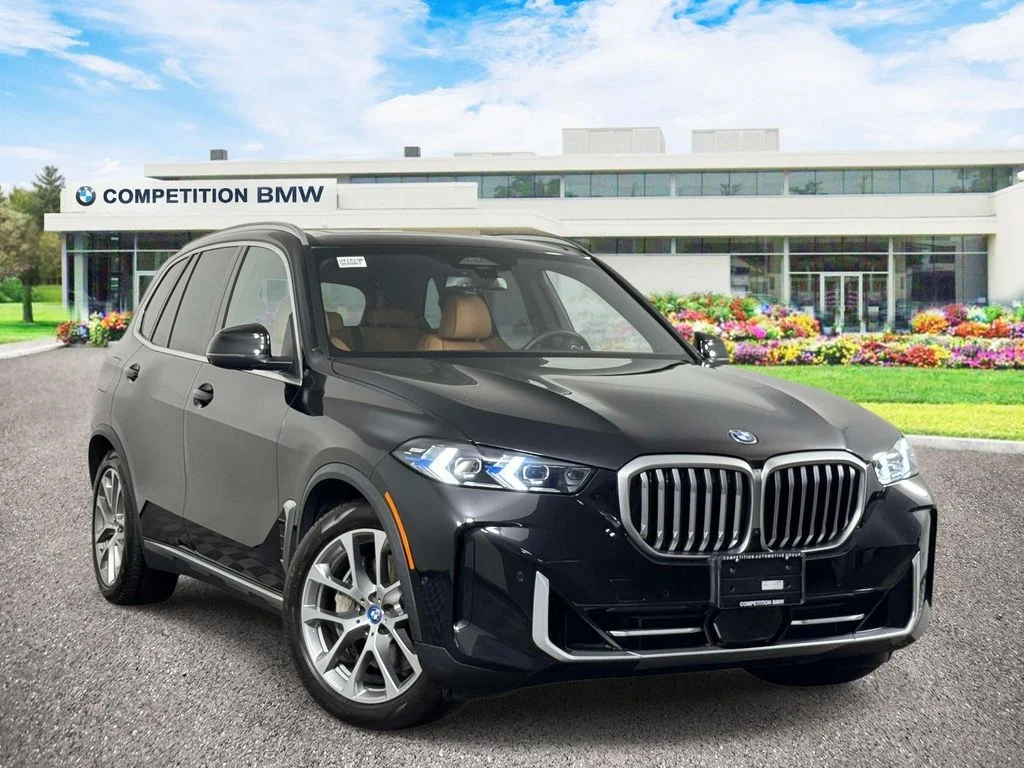 Certified Used 2024 Black BMW xDrive50e image 1