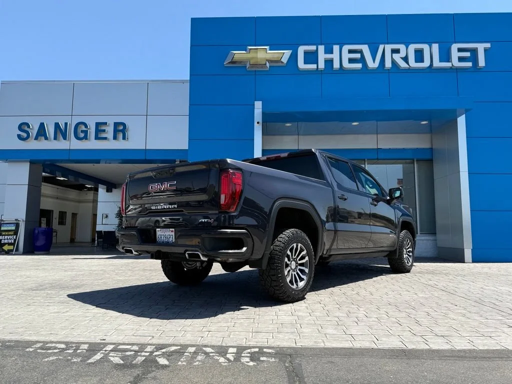 Used 2023 Titanium Rush Metallic GMC AT4 image 8