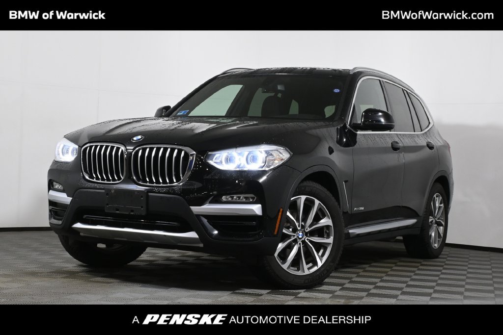 Used 2018 Black BMW xDrive30i image 1