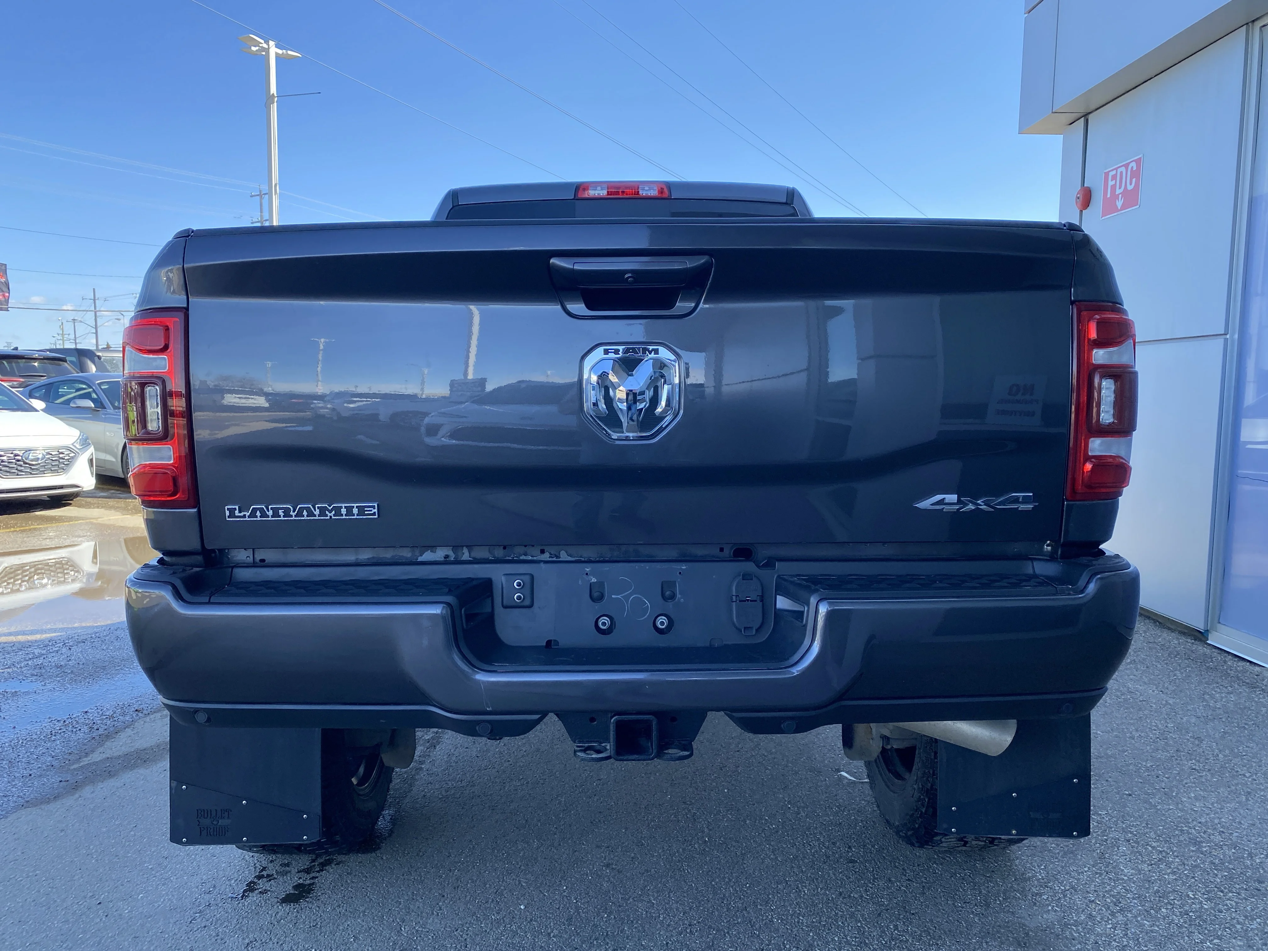 Certified Used 2022 Gray Ram Laramie * LIFTED * WHEELS AND TIRES * image 4