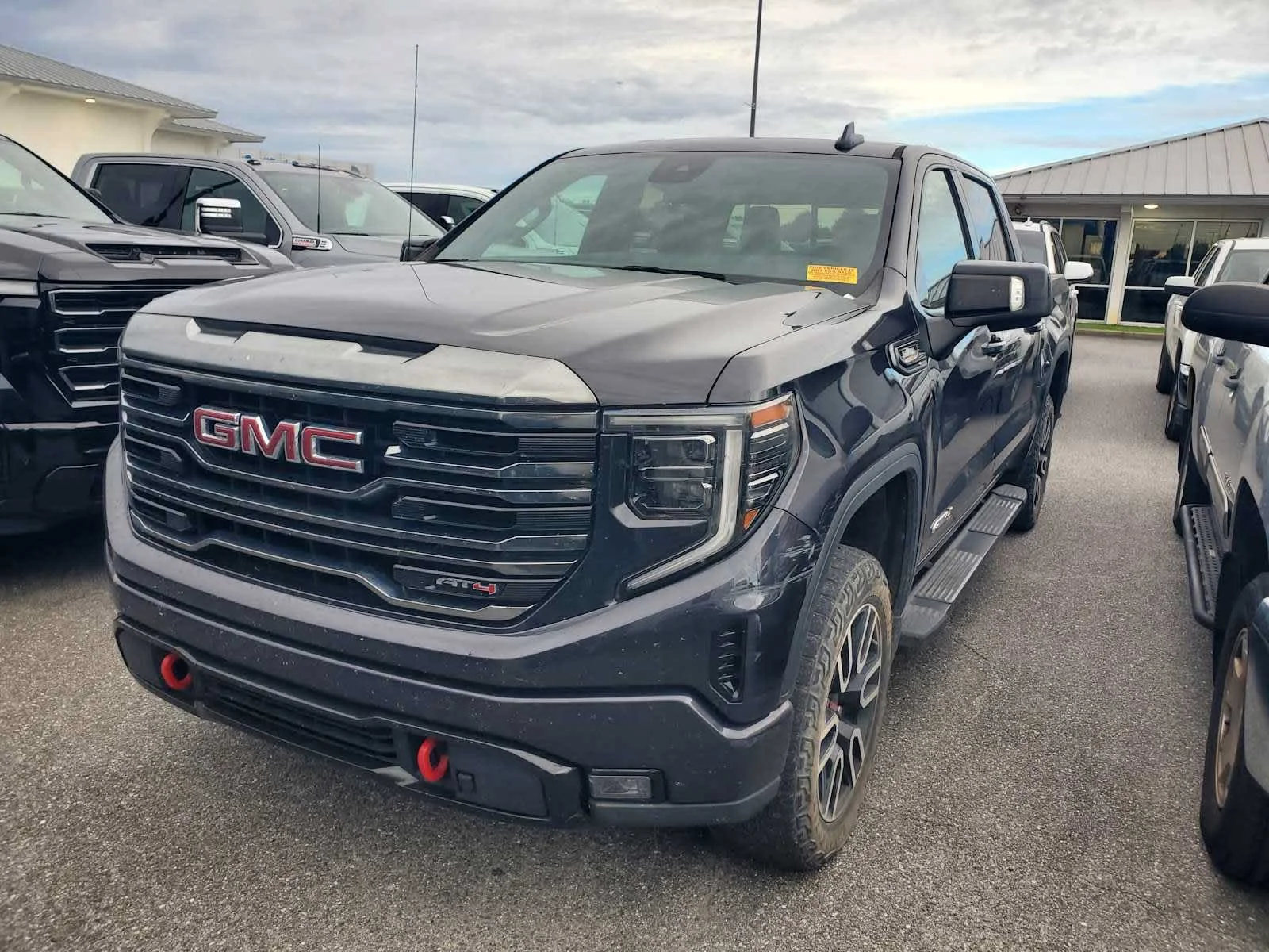 Used 2022 TITANIUM RUSH METALLIC GMC AT4 image 1