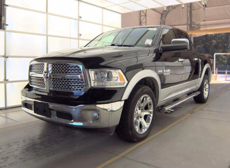 Used 2017 Brilliant Black Crystal Pearlcoat Ram Laramie image 1