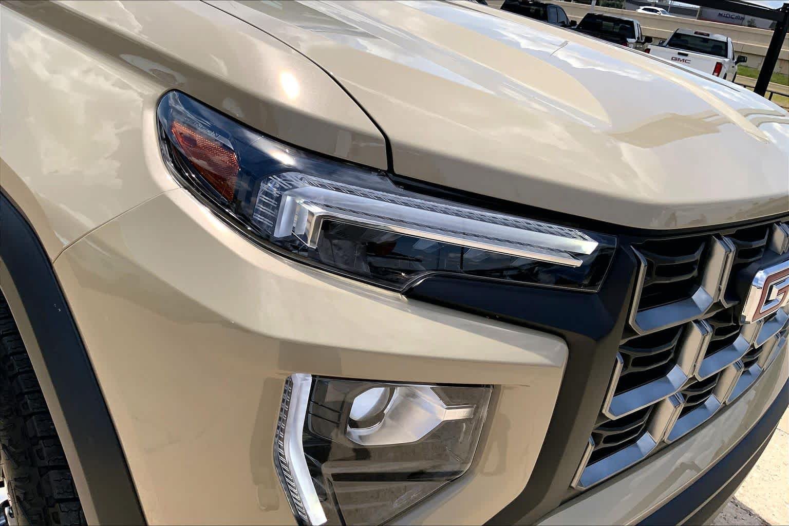 Used 2024 Desert Sand Metallic GMC 4WD AT4 image 27