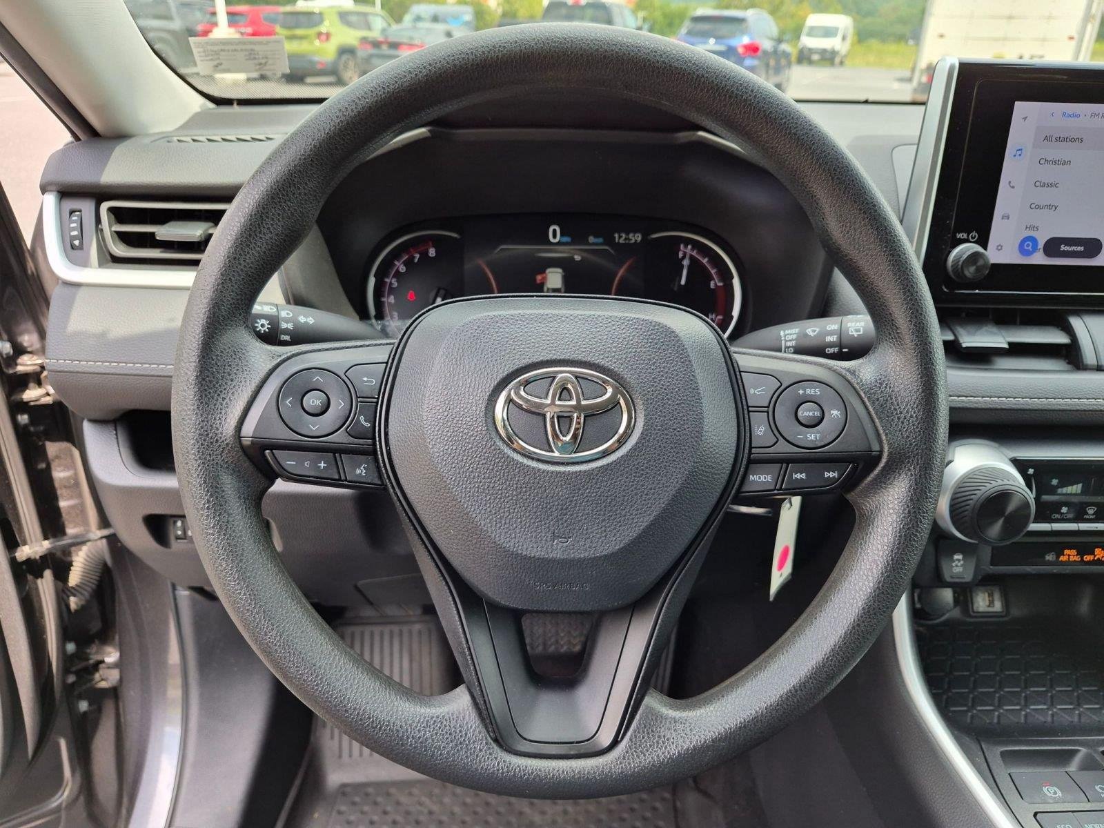 Used 2023 Magnetic Gray Metallic Toyota LE image 17