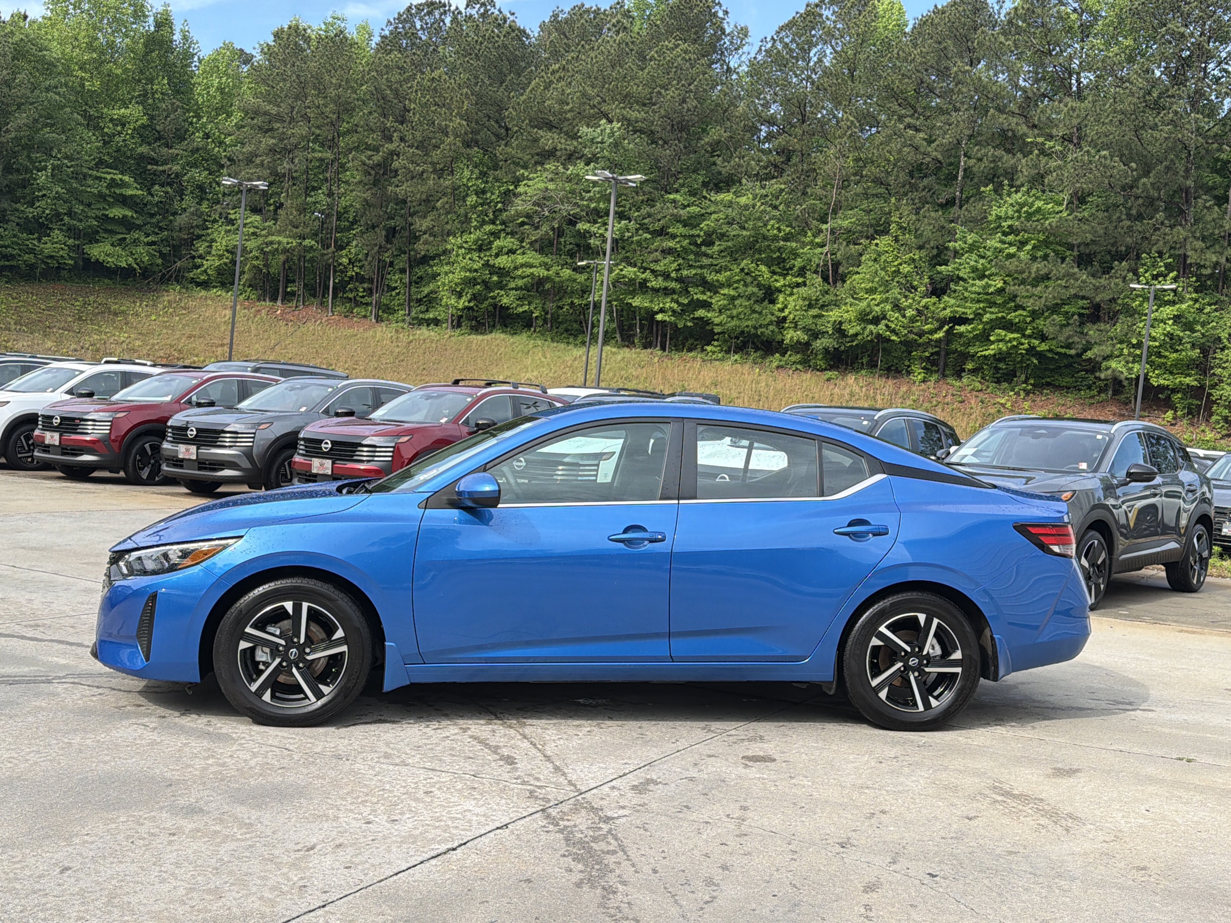 Used 2025 Electric Blue Metallic Nissan SV image 5