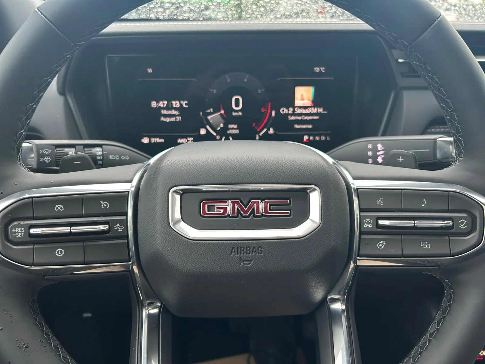 New 2027 Summit White GMC AWD Elevation image 23