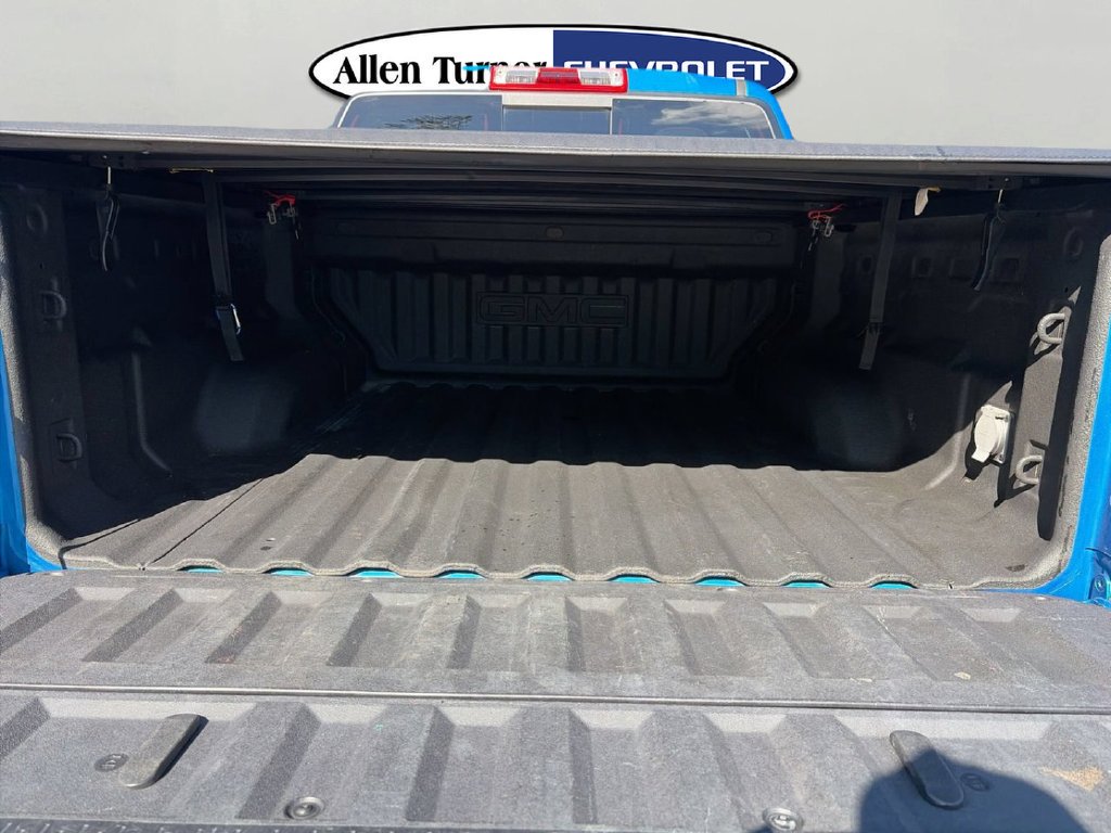 Used 2023 DYNAMIC BLUE METALLIC GMC 4WD AT4 image 7