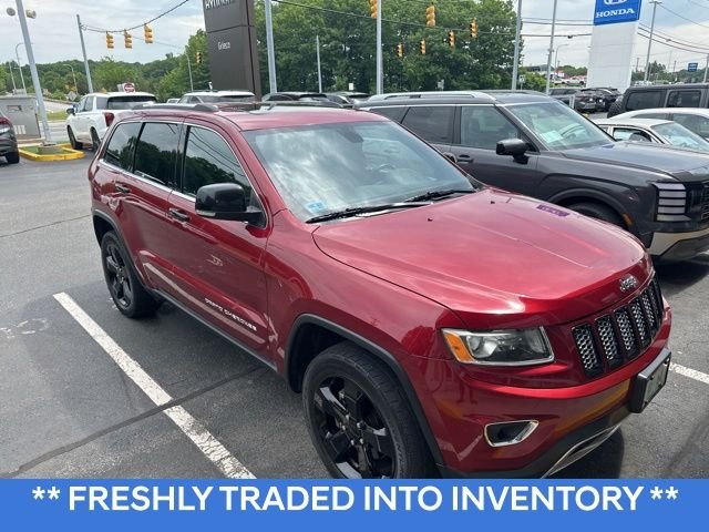Used 2014 Red Jeep Limited image 1