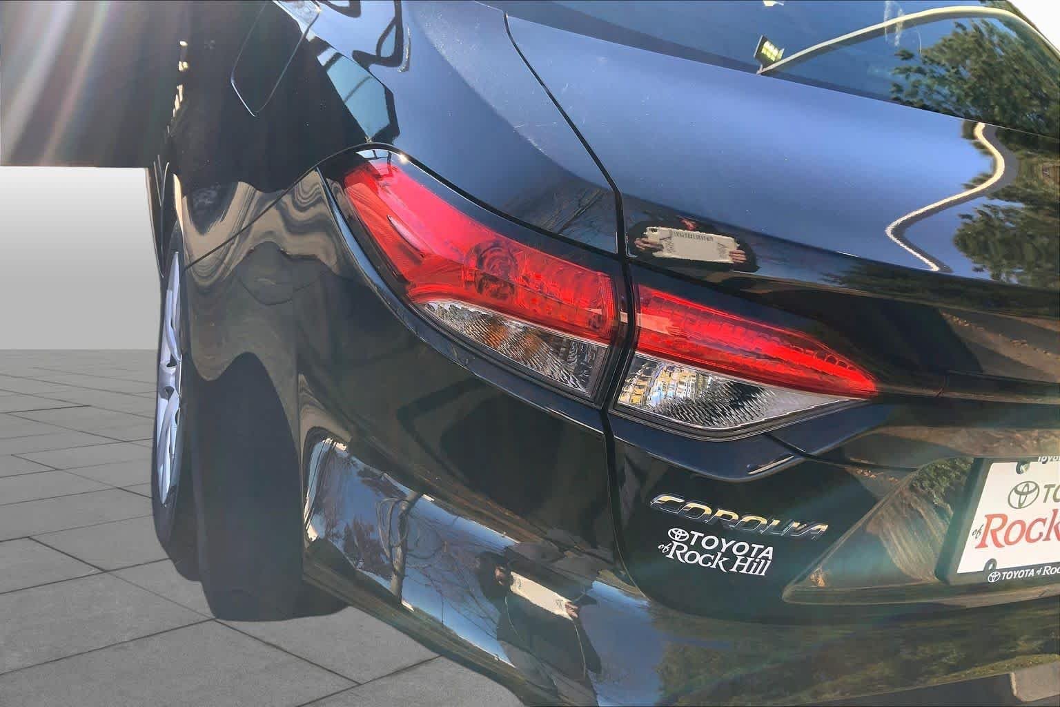 Used 2022 Black Sand Pearl Toyota LE image 27