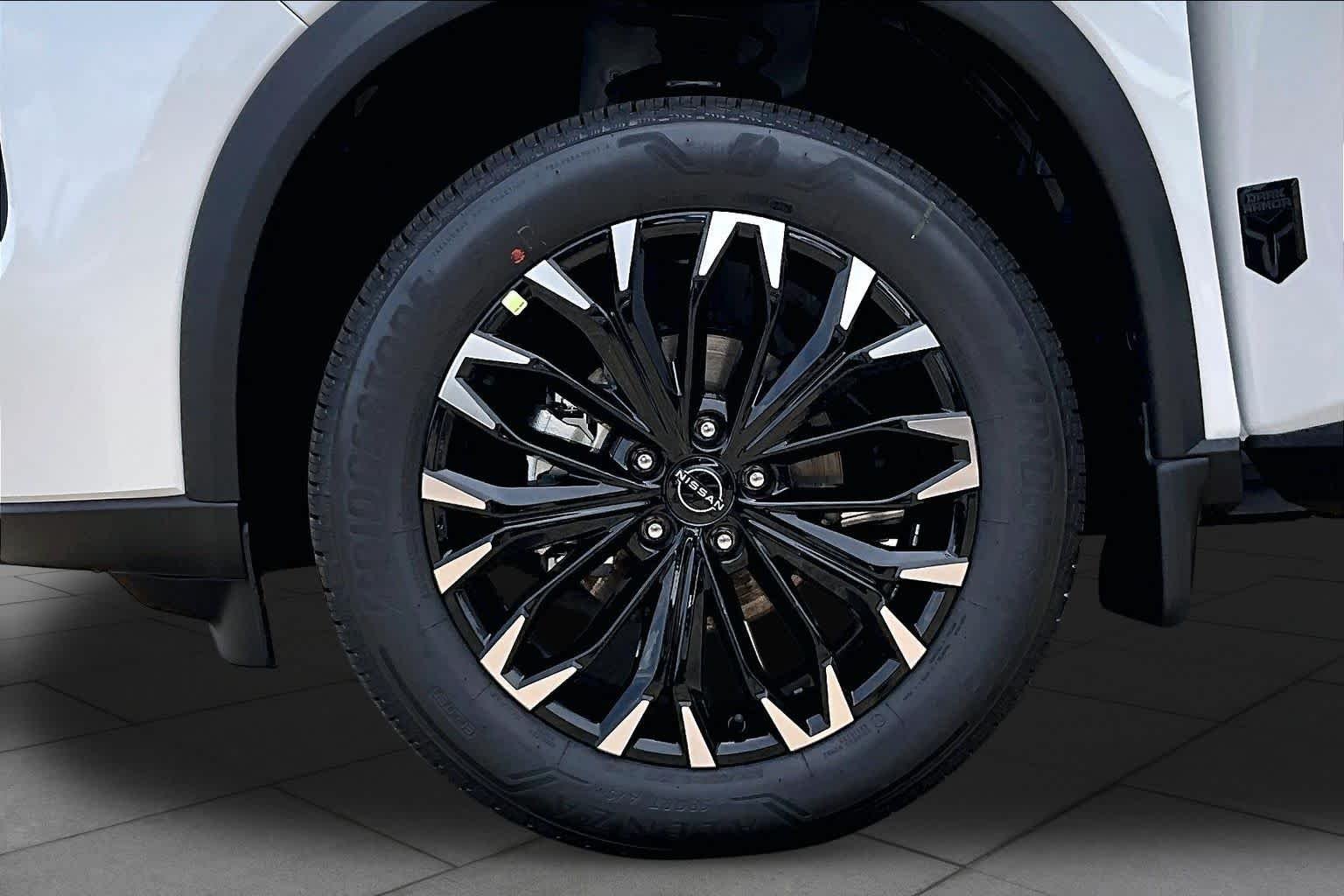New 2026 Everest White Pearl TriCoat Nissan Dark Armor image 9