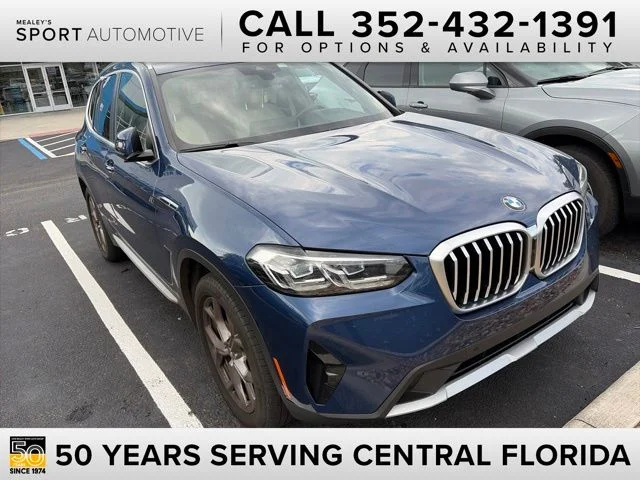 Used 2022 Blue BMW sDrive30i image 1