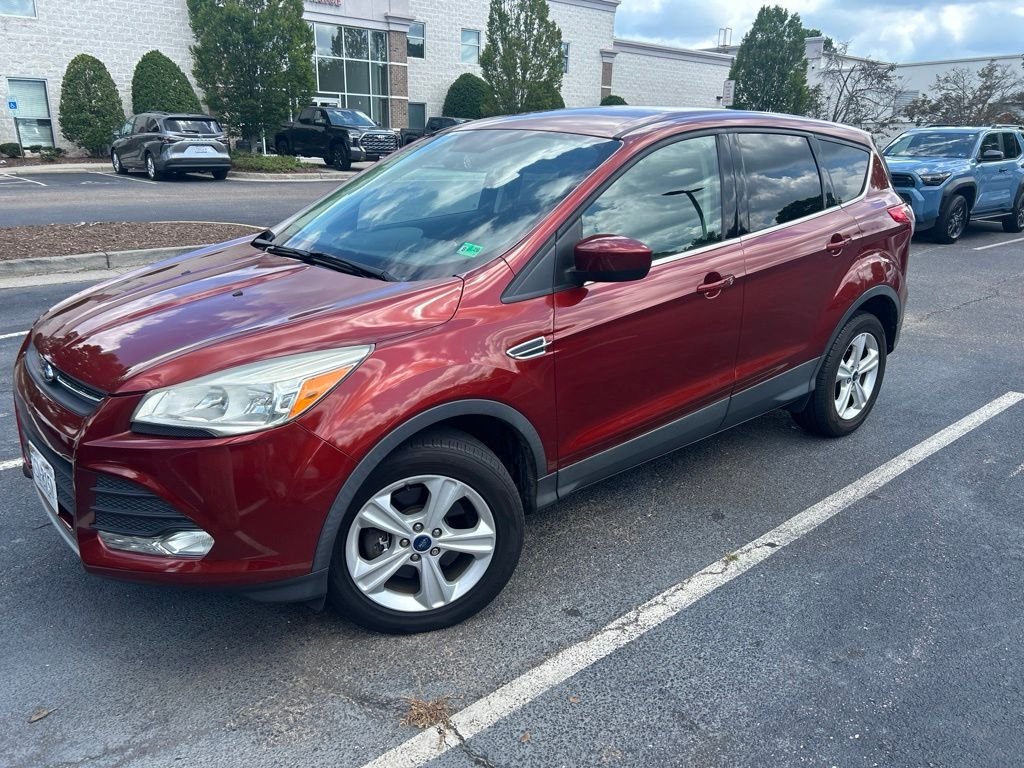 Used 2015 Orange Ford SE image 4