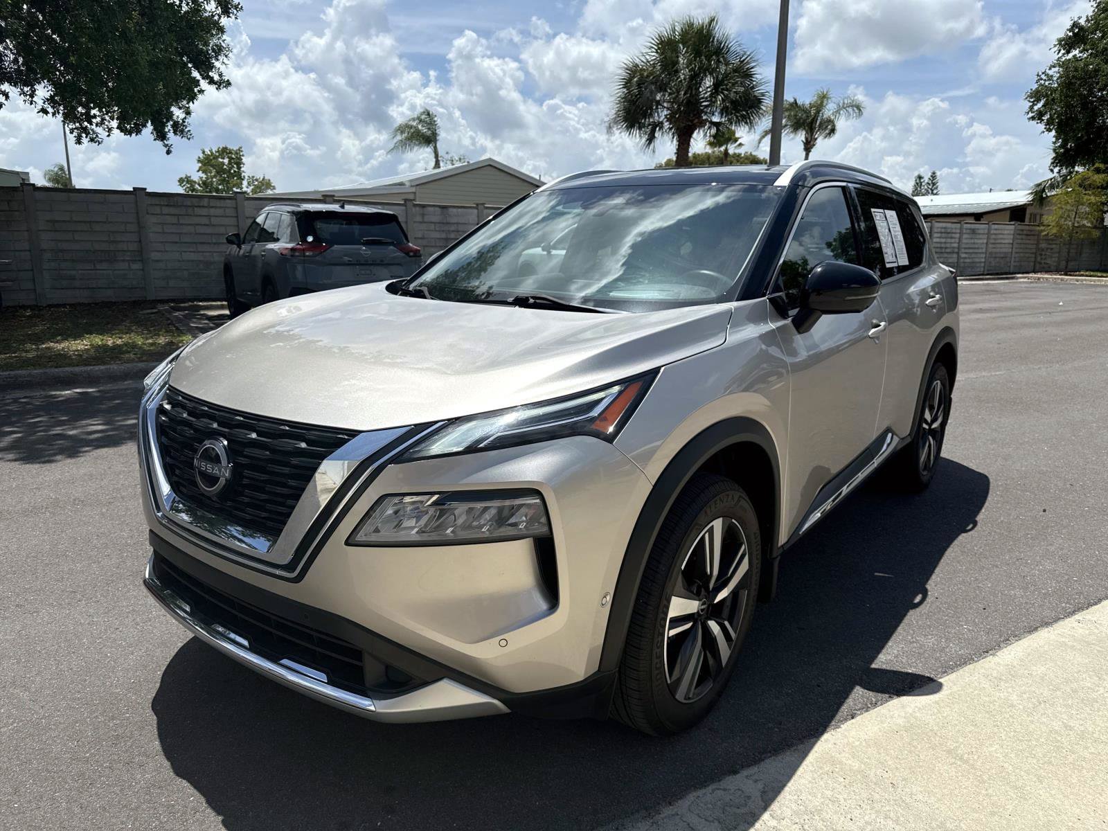 Used 2023 Champagne Silver Metallic/Super Black Nissan Platinum image 1