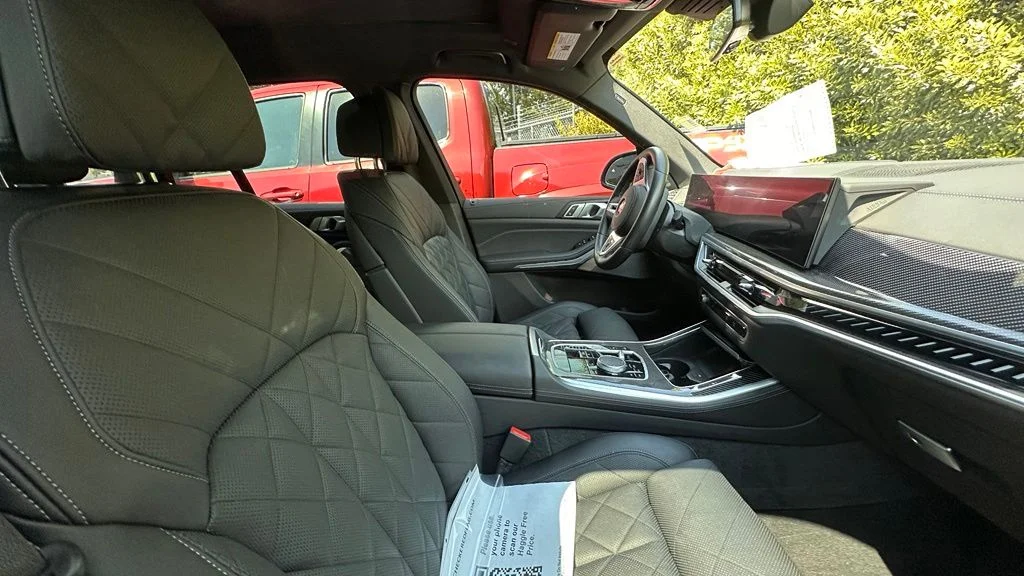 Used 2024 Black Sapphire Metallic BMW M60i image 4