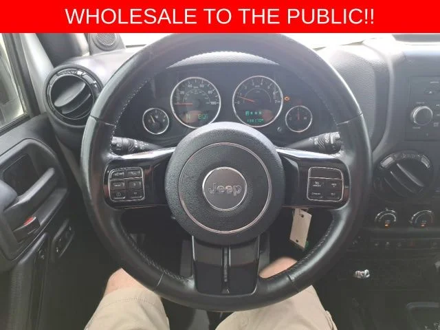 Used 2014 White Jeep Unlimited Sahara image 17