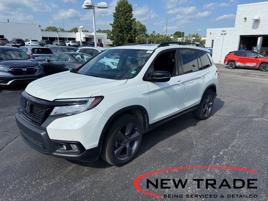 Certified Used 2019 White Diamond Pearl Honda Touring image 1