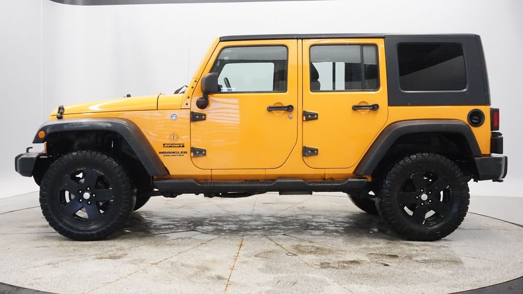 Used 2012 Jeep Wrangler Unlimited Sport with VIN 1C4BJWDG5CL243273 for sale in Coon Rapids, Minnesota