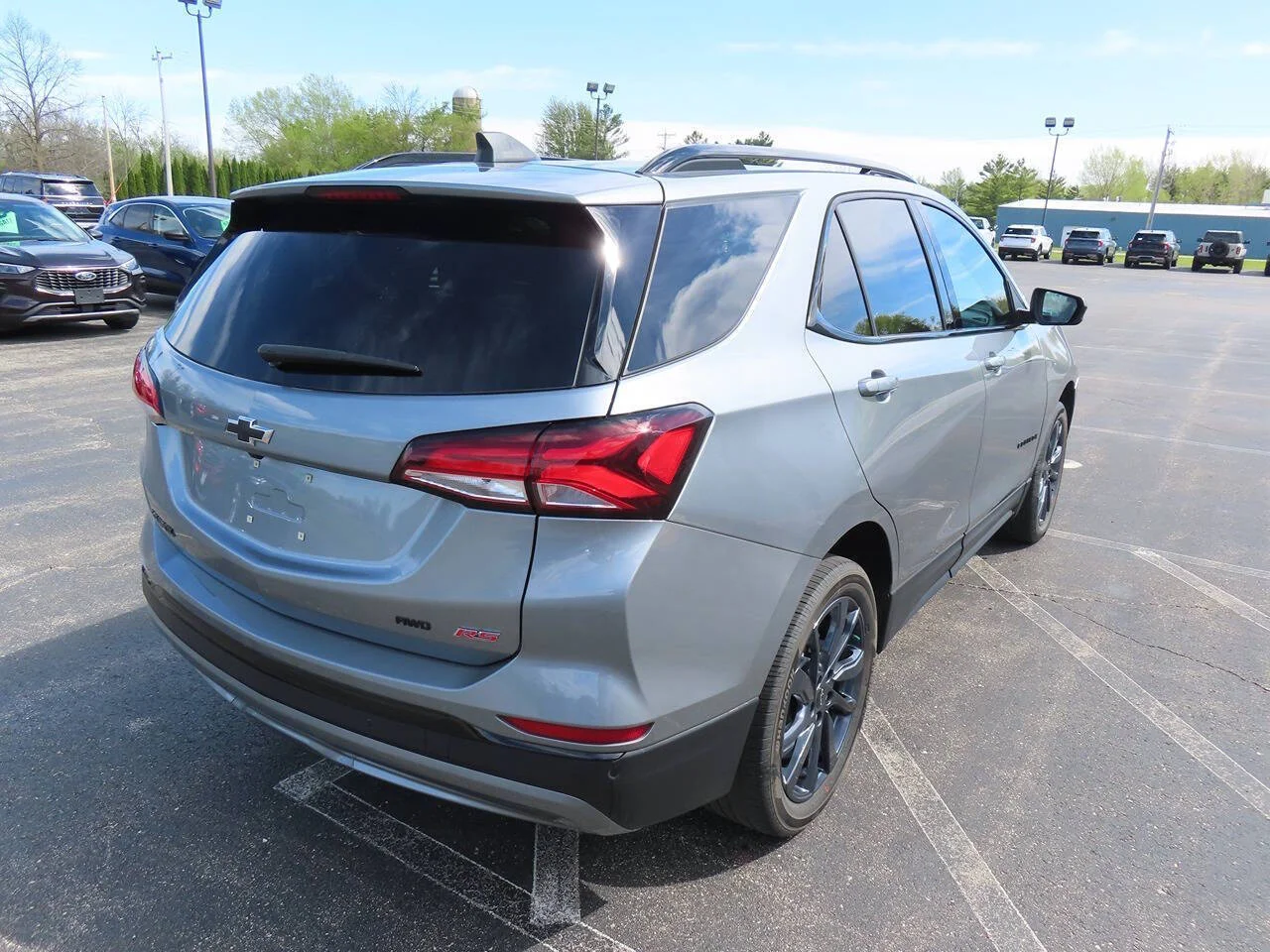 Used 2024 Sterling Gray Metallic Chevrolet RS 4x4 4dr SUV image 4