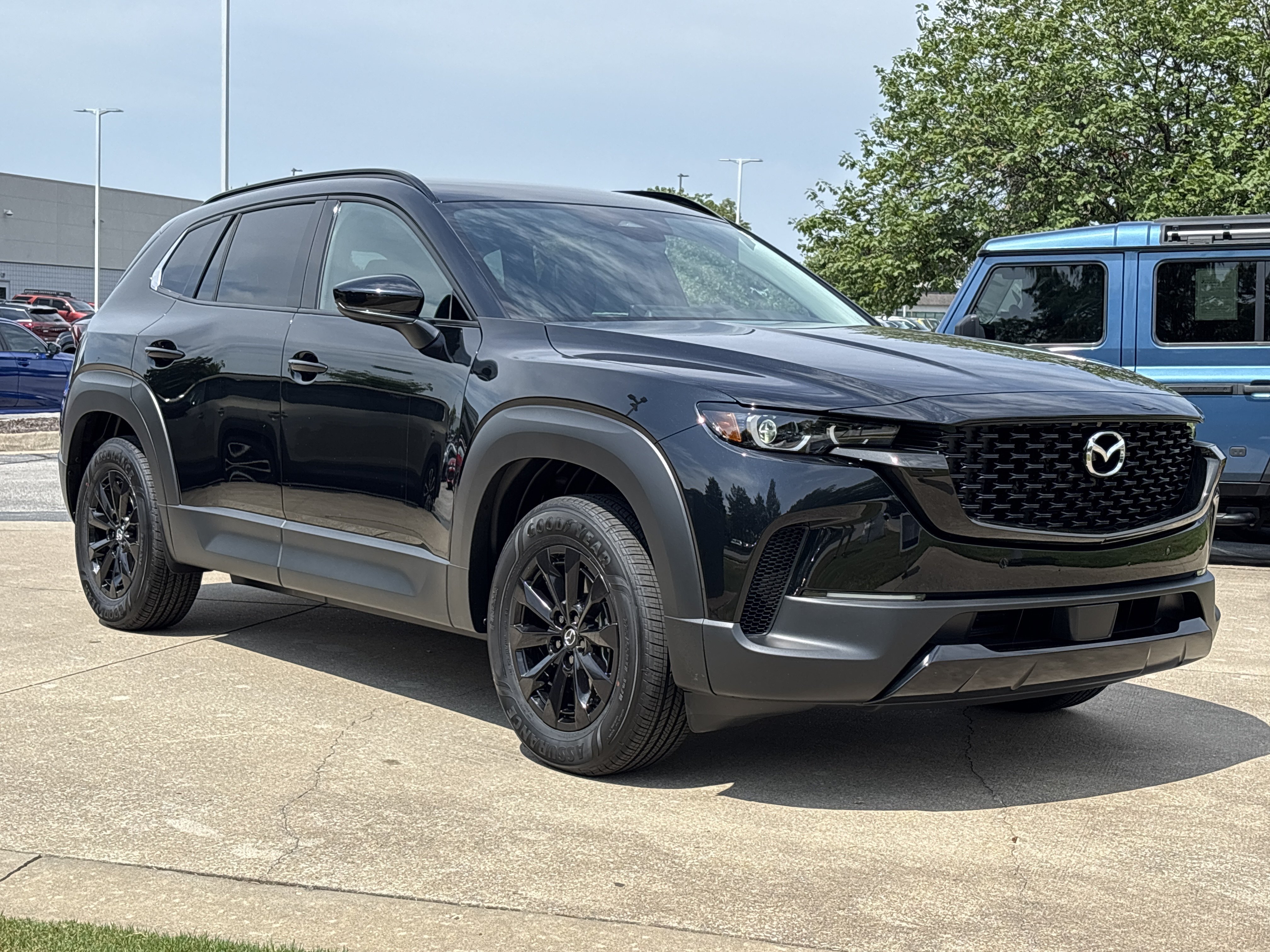 New 2026 Jet Black Mica Mazda Premium image 1