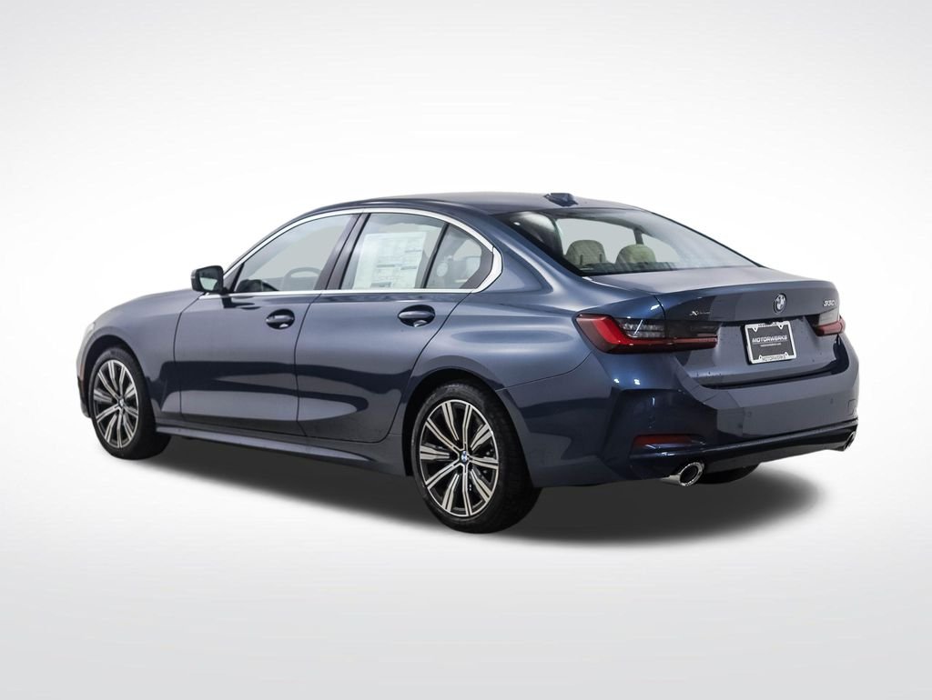 Used 2026 Blue Metallic BMW 330i xDrive image 4