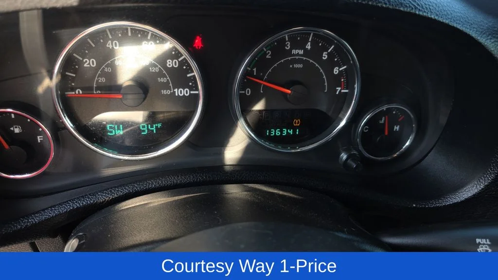 Used 2013 White Jeep Unlimited Sport image 13