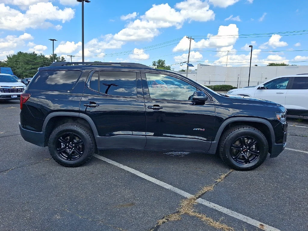 Used 2023 Ebony Twilight Metallic GMC AT4 image 13
