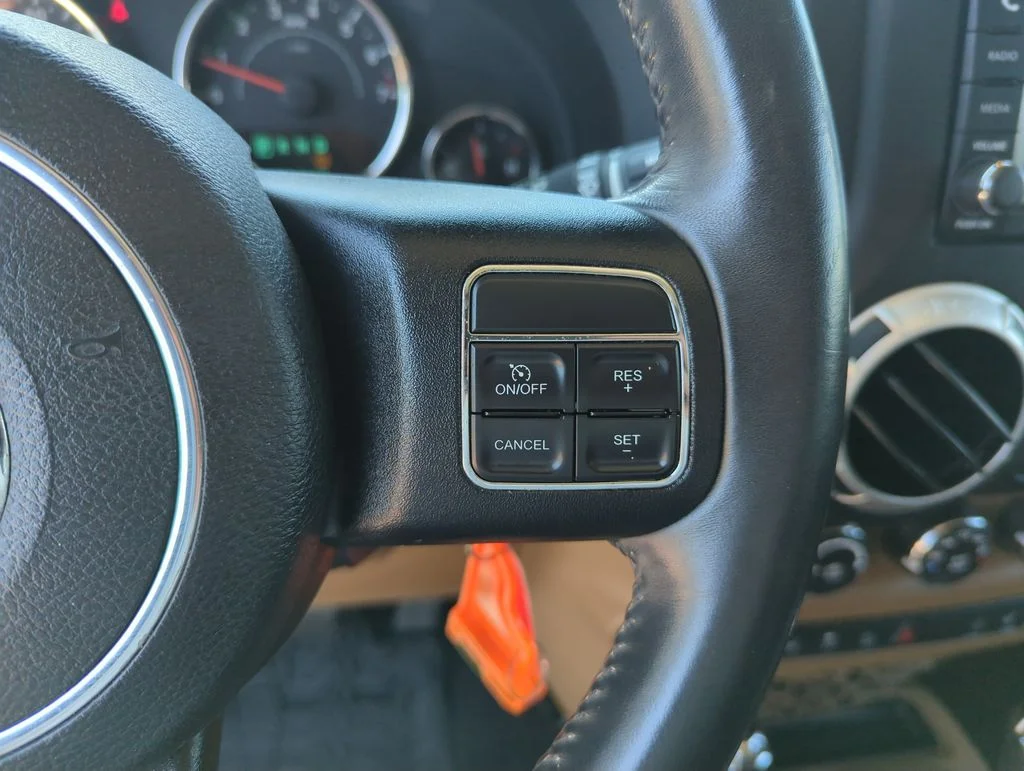 Used 2014 Black Jeep Unlimited Sahara image 22