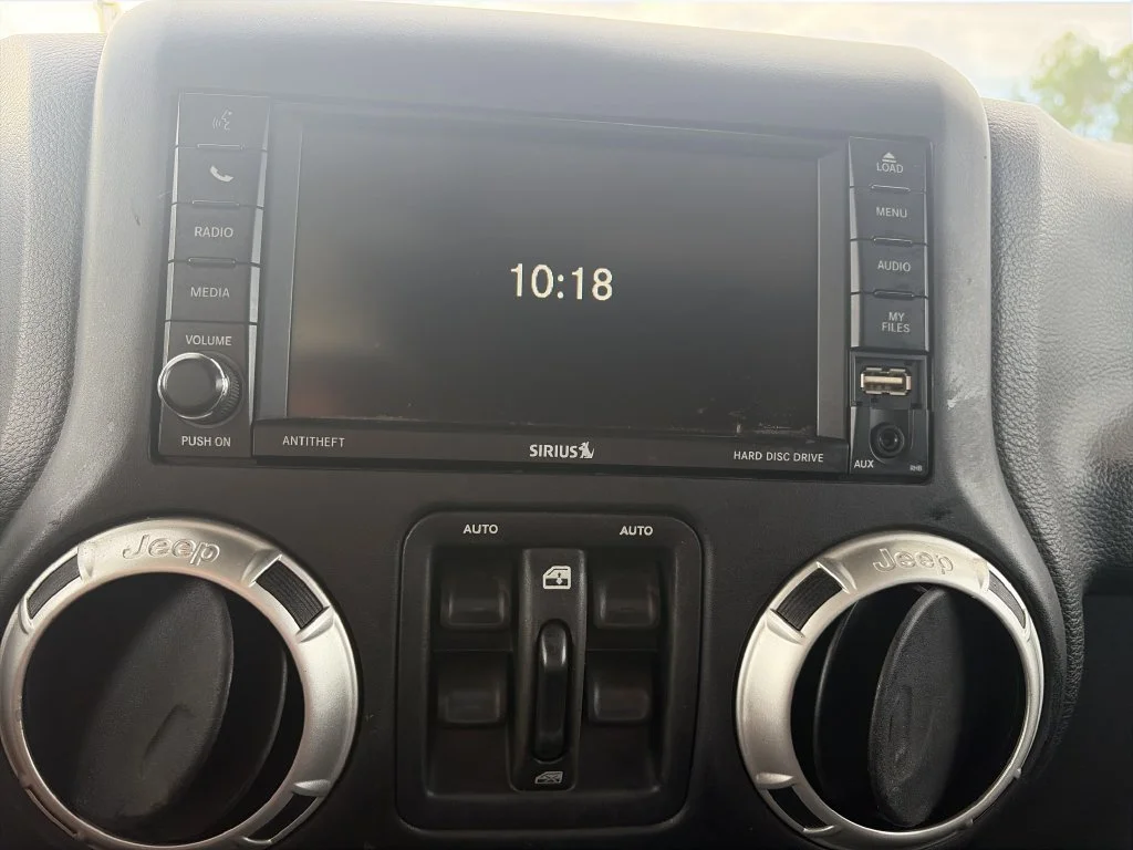 Used 2017 Silver Jeep Unlimited Sahara image 20