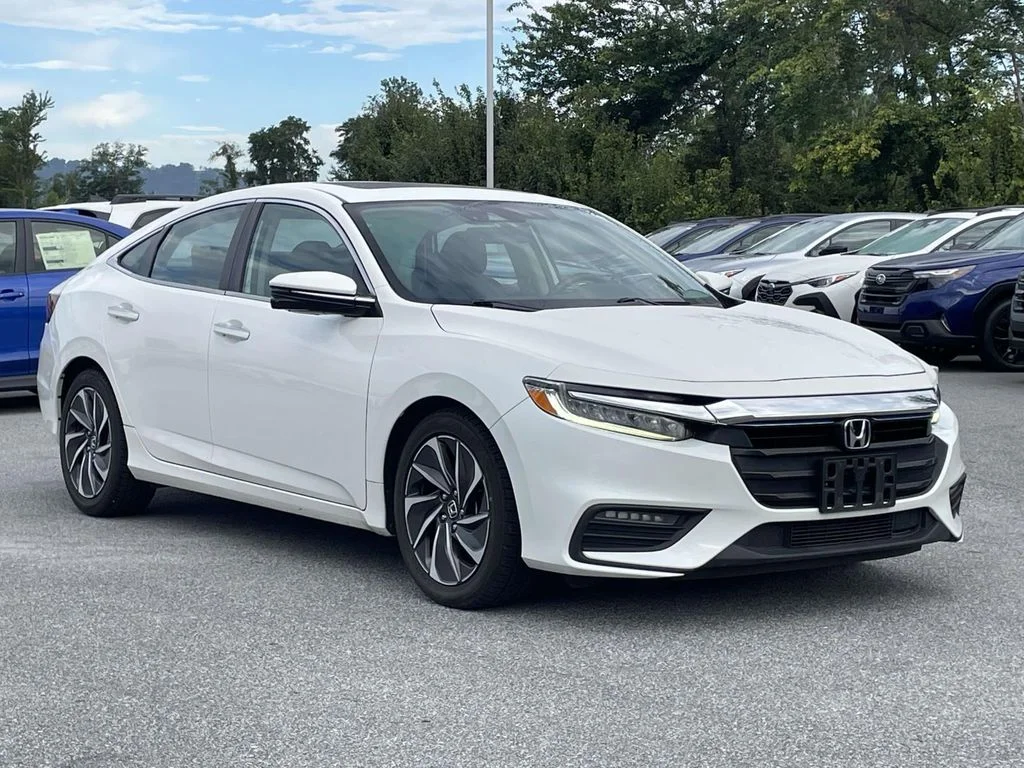 Used 2019 White Orchid Pearl Honda Touring image 1