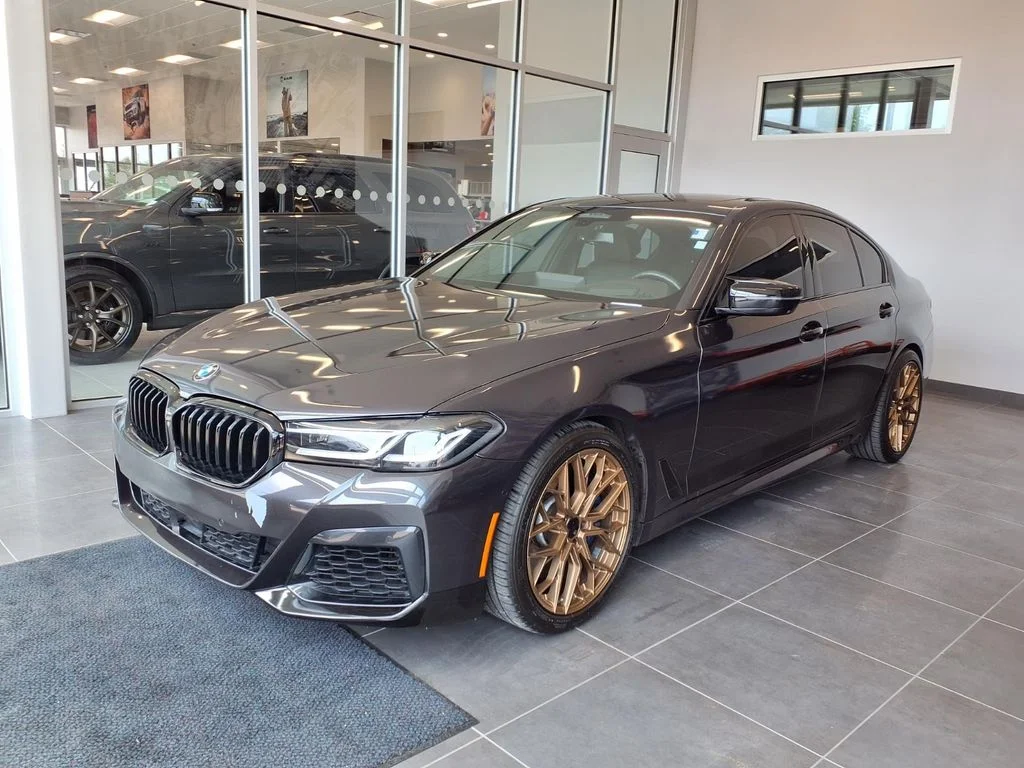 Used 2021 BMW 5 Series M550i with VIN WBA13BK05MCF05699 for sale in Kansas City