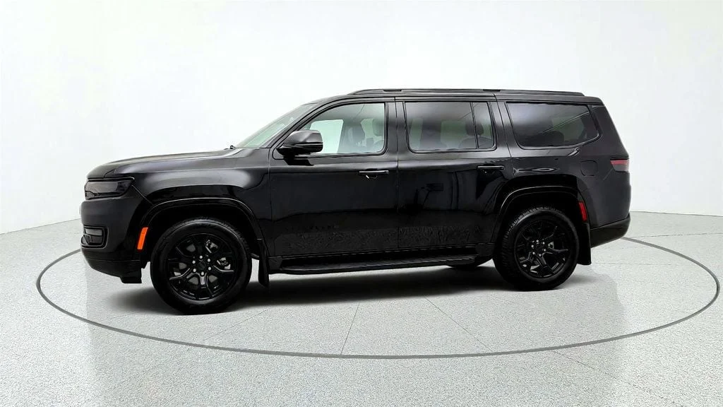 Used 2025 Diamond Black Crystal Pearlcoat Jeep Series II Carbide 4x4 w/ Rear Entertainment & 20