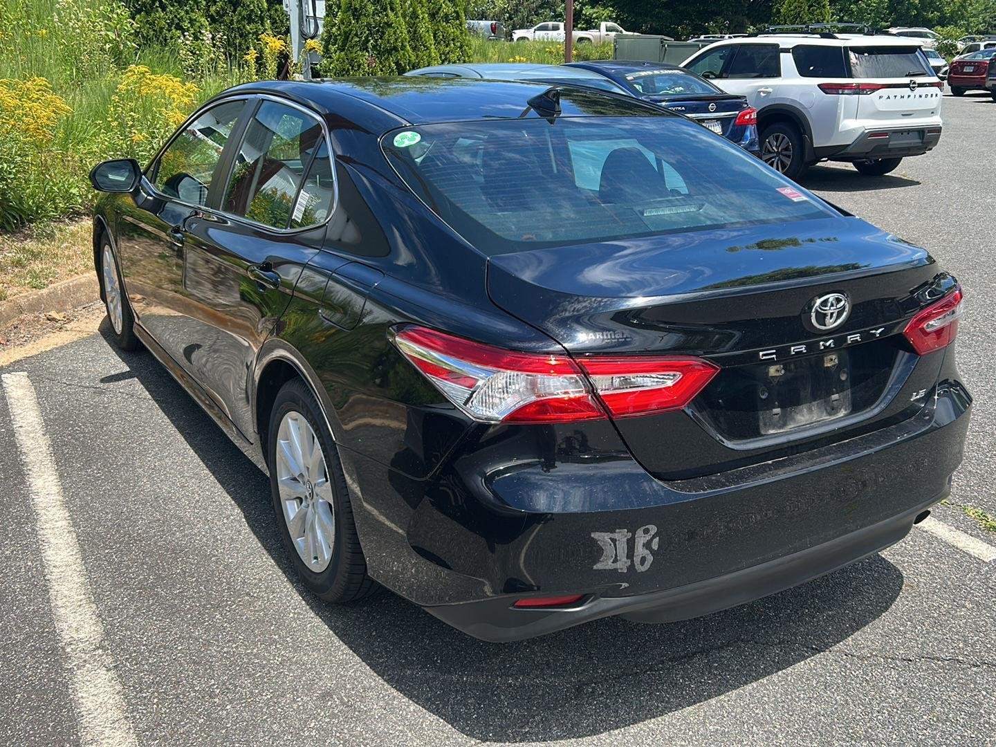 Used 2020 Midnight Black Metallic Toyota LE image 2