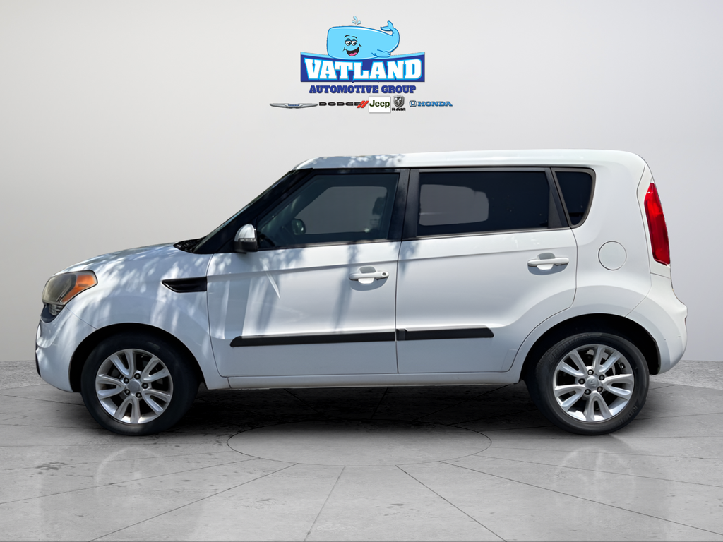 Used 2012 White Kia Plus image 2