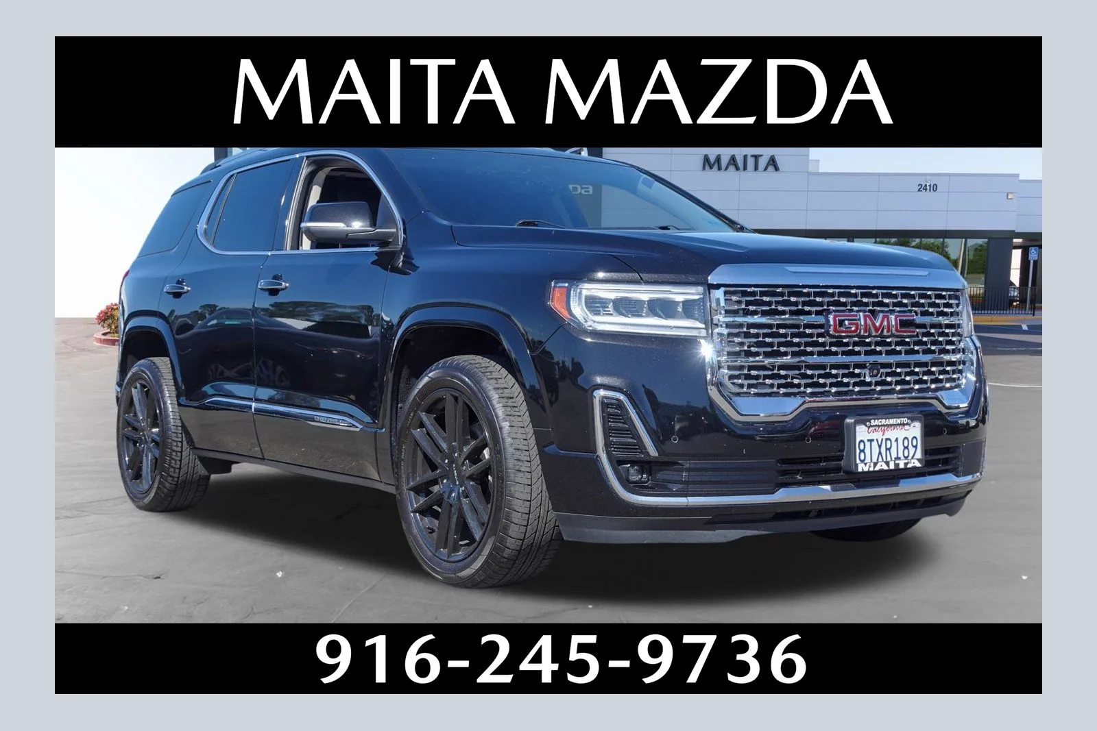 Used 2021 Ebony Twilight Metallic GMC Denali image 1