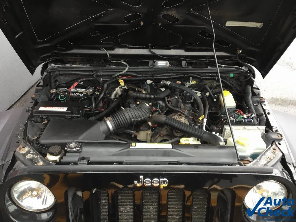Used 2010 Black Jeep Unlimited Sport image 29