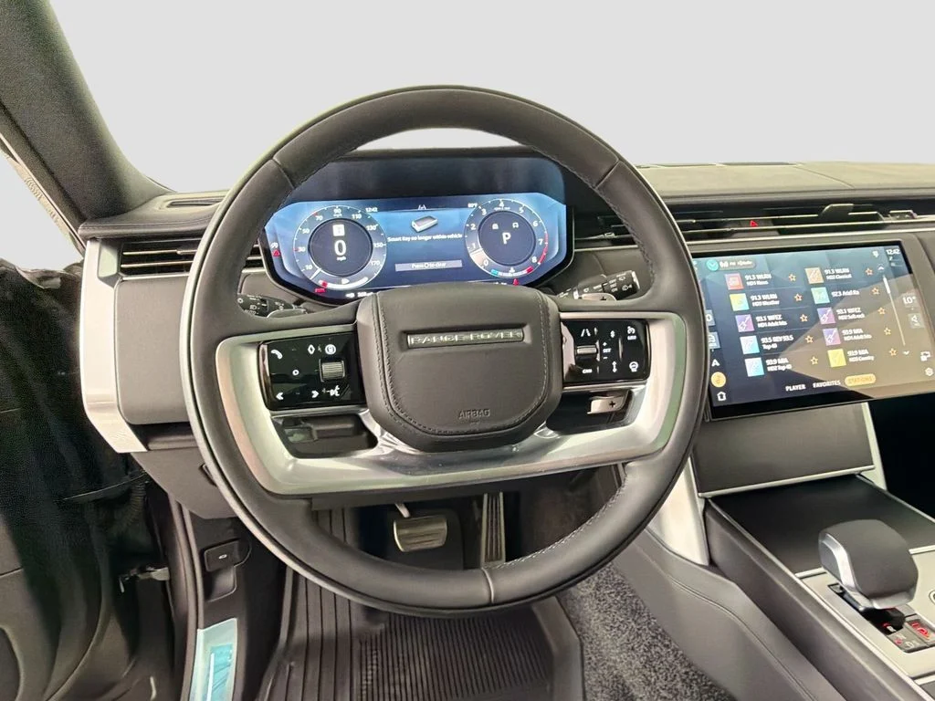 New 2026 Obsidian Black Satin Land Rover SE image 11